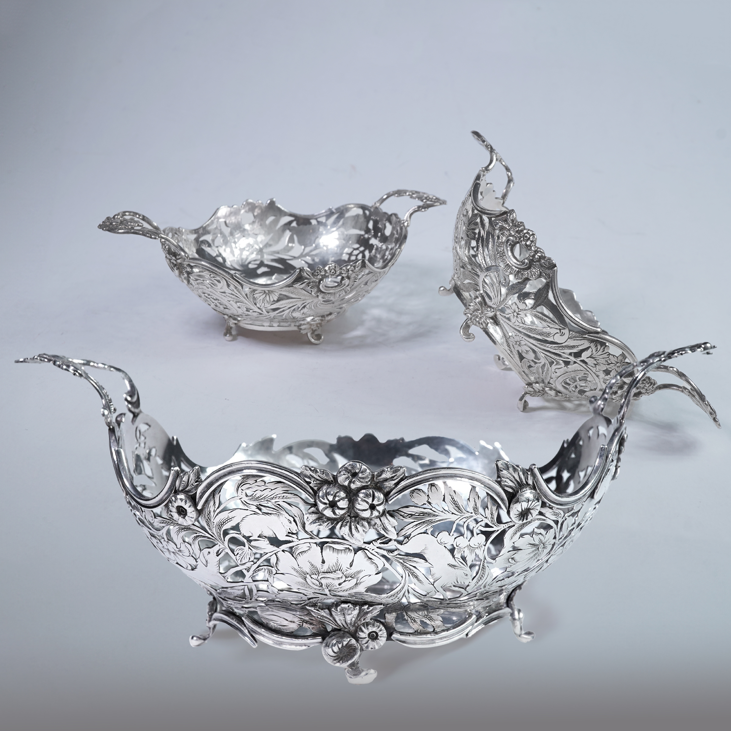 Rococo silver baskets — set of four, Dutch or English, c.1730s