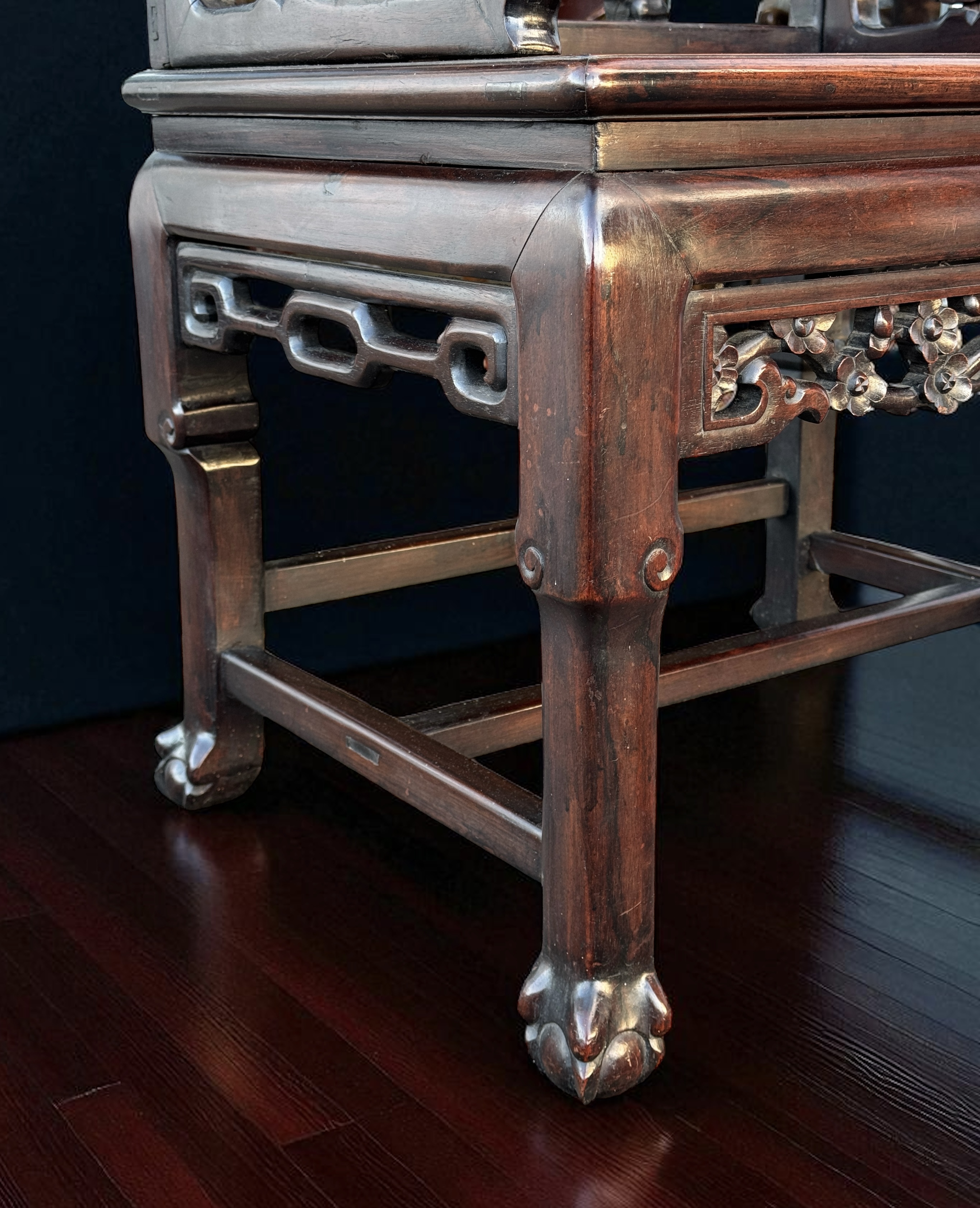 Qing armchair — inscription detail beneath the seat