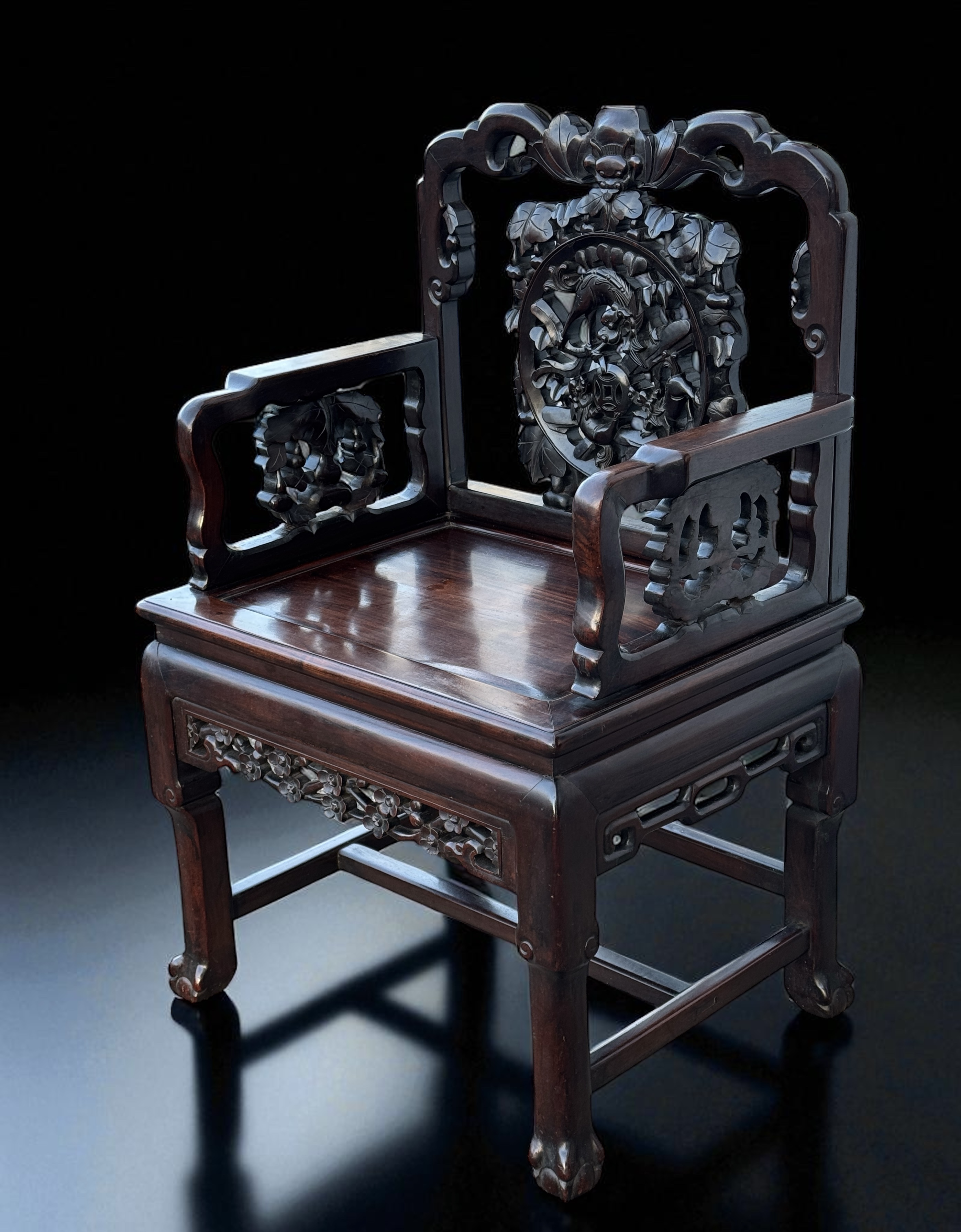 Qing Dynasty hongmu armchair — front view